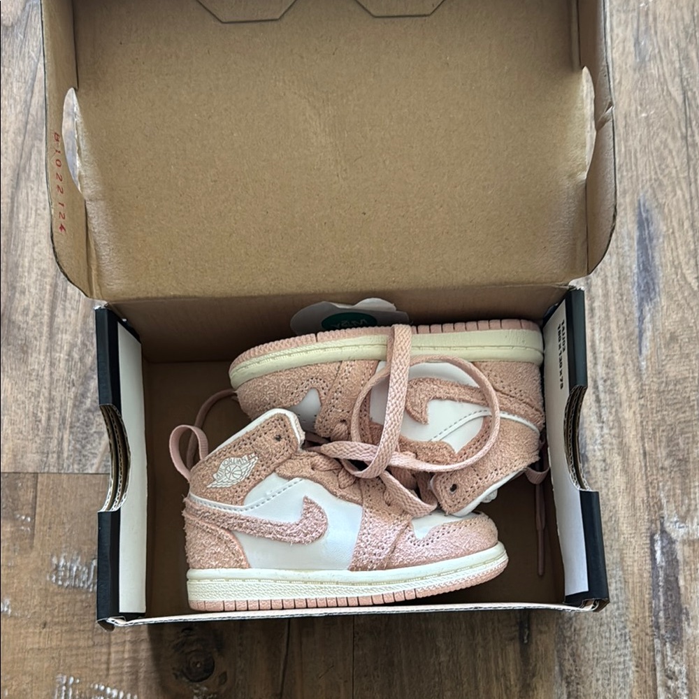 baby Nike Jordan’s Pink and White Sneakers